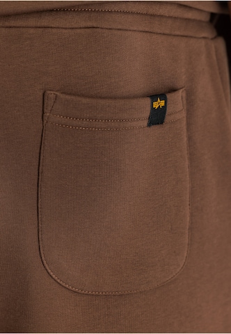 ALPHA INDUSTRIES Tapered Pants 'DTM' in Brown
