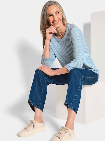 Goldner Pullover in Blau