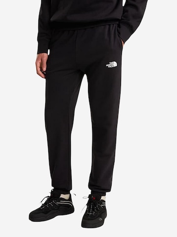 regular Pantaloni sportivi 'M SIMPLE DOME JOGG NF0A8C41' di THE NORTH FACE in nero: frontale