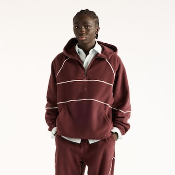 new balance Trui 'Trackside Polar Fleece Hoodie' in Rood: voorkant