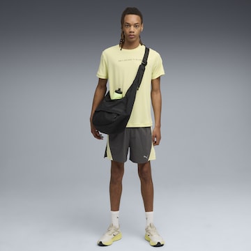 PUMA Performance shirt 'Run Club' in Yellow