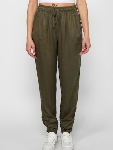 KOROSHI Loose fit Sports trousers in Green: front