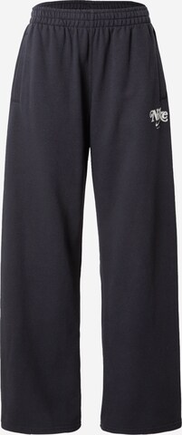 Nike Sportswear Loose fit Trousers in Black: front