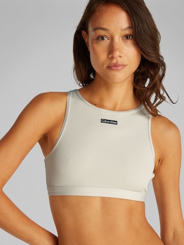 Calvin Klein Swimwear Bralette Bikini top in Beige: front
