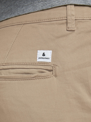 smėlio JACK & JONES Prigludęs „Chino“ stiliaus kelnės 'Marco'