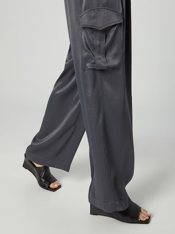 ABOUT YOU x Chiara Biasi Loose fit Pleat-Front Pants 'Iris' in Grey