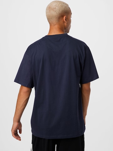 Karl Kani Regularny krój Koszulka w kolorze niebieski