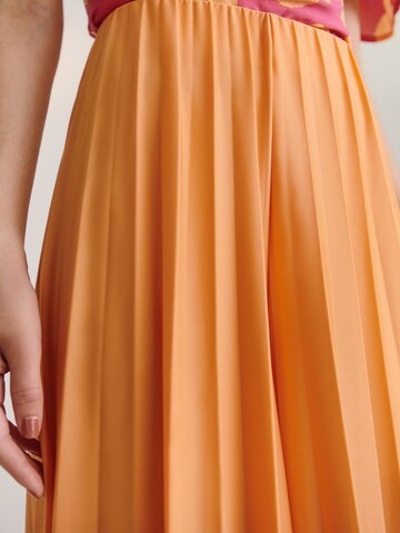 Guido Maria Kretschmer Women Široke hlačnice Hlače 'Samantha' | oranžna barva