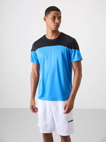T-Shirt fonctionnel Tommy Life en bleu : devant
