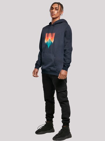 Pull-over 'Berg Sonnenuntergang Geometrisch' F4NT4STIC en bleu