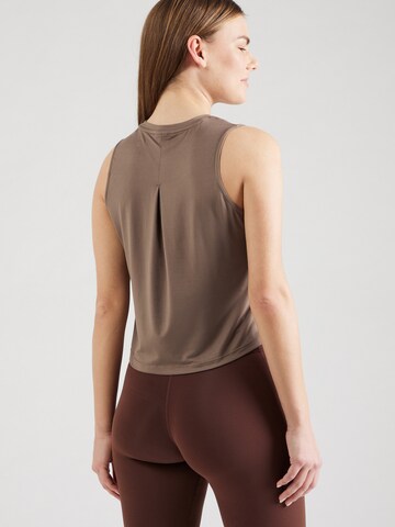Athlecia Sports top 'Pacy' in Brown