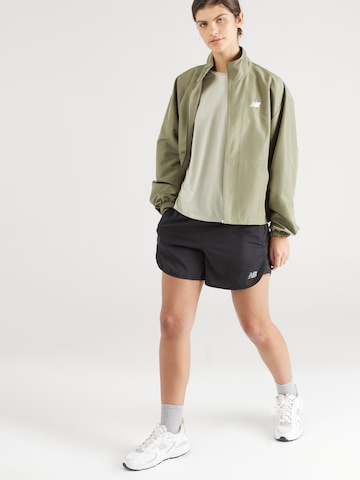 new balance - Chaqueta de entretiempo en verde