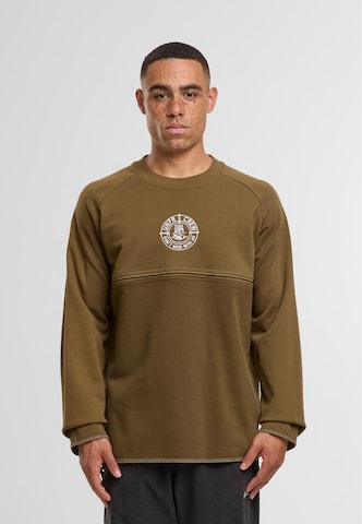 Unfair Athletics Sweatshirt in Green