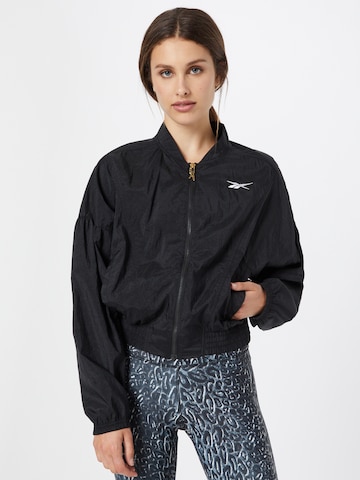 Reebok - Casaco deportivo 'Studio Shiny' em preto: frente