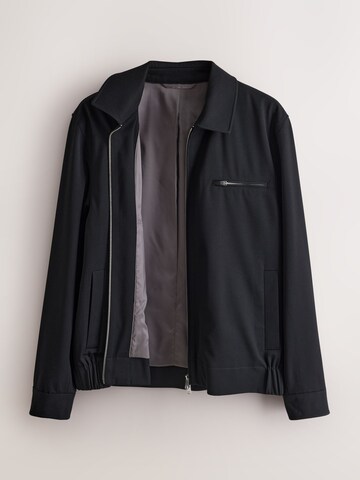 Next - Chaqueta de entretiempo 'Motionflex' en negro