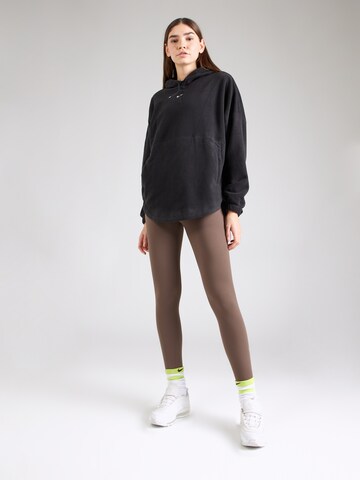 Skinny Pantaloni sportivi 'ONE' di NIKE in marrone