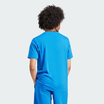 ADIDAS ORIGINALS T-shirt 'Trefoil Essentials' i blå