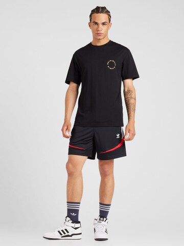 ADIDAS ORIGINALS - regular Pantalón 'Archive' en negro