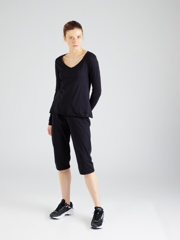 Maglietta di Champion Authentic Athletic Apparel in nero