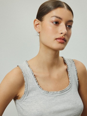Haut Next en gris