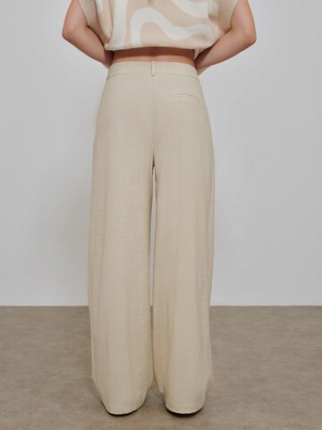 florence by mills exclusive for ABOUT YOU Wide leg Pleat-front trousers 'Foliage' in Beige