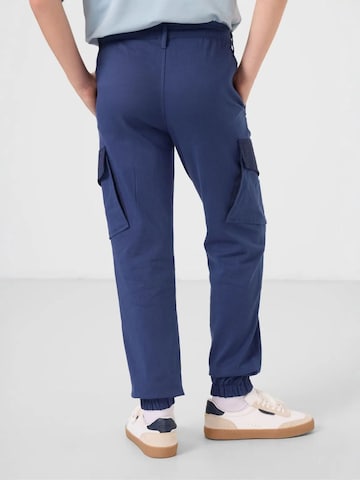 Pantalon 'TOMMY Kinder Cargo-Joggerhose' Tommy Life en bleu