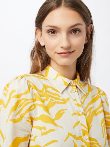 Aligne - Vestidos camiseiros 'Cecilie' em amarelo