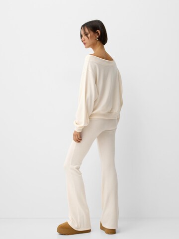 Bershka Flared Nadrág - bézs