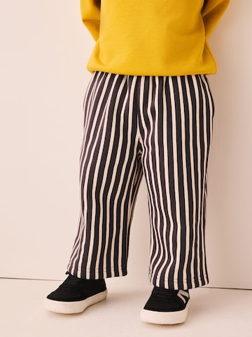 Baskets Next en noir