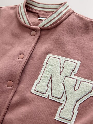 Next Tussenjas in Bruin