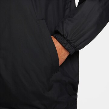 Nike Sportswear Between-season jacket 'Club Coaches' in Black
