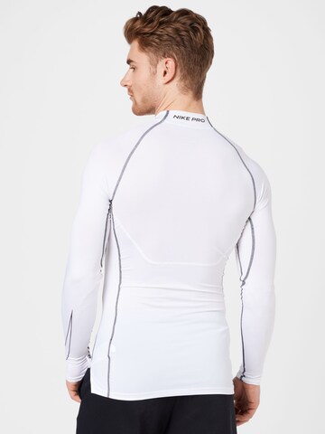 Maglia funzionale di NIKE in bianco