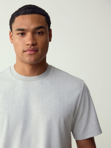 T-Shirt Next en gris