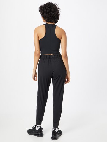 NIKE Tapered Workout Pants in Black