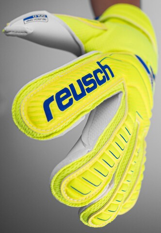 REUSCH Athletic Gloves 'Attrakt' in Yellow