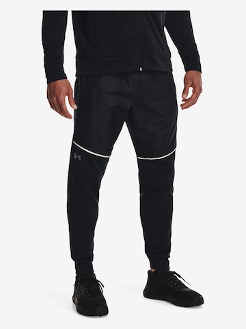UNDER ARMOUR Slimfit Sportsbukser i svart: forside
