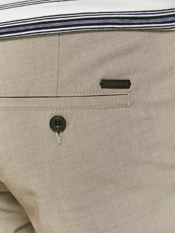 smėlio JACK & JONES Prigludęs „Chino“ stiliaus kelnės 'Marco Connor'