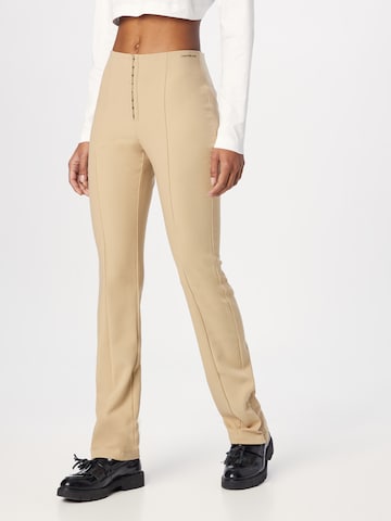 Pantalon Calvin Klein Jeans en beige : devant
