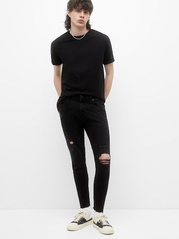 Pull&Bear Tapered Jeans in Zwart