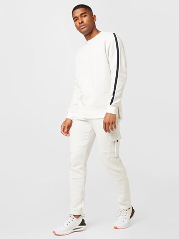 Sweat de sport 'Essential' UNDER ARMOUR en blanc