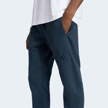 ADIDAS SPORTSWEAR Tapered Workout Pants in Blue