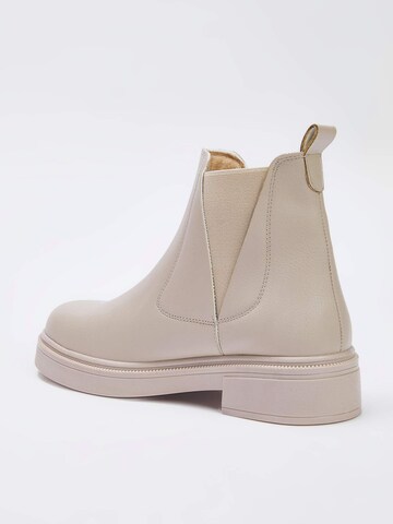 Trendyol Chelsea boots in Beige