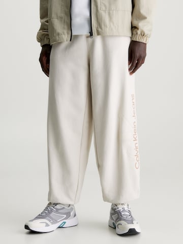 Loosefit Pantalon Calvin Klein Jeans en beige : devant