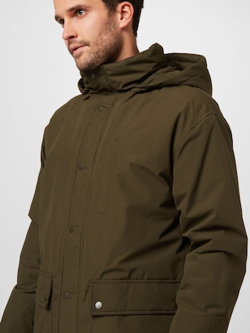 Manteau mi-saison 'Paul' ABOUT YOU en vert