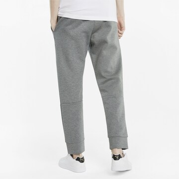 Effilé Pantalon de sport PUMA en gris