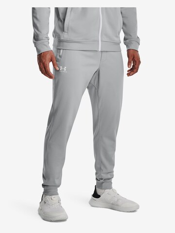 UNDER ARMOUR Tapered Workout Pants in Grey: front