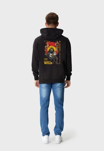 Oldskull Sweatjacke 'Wrldvibe Return to Wild' in Schwarz
