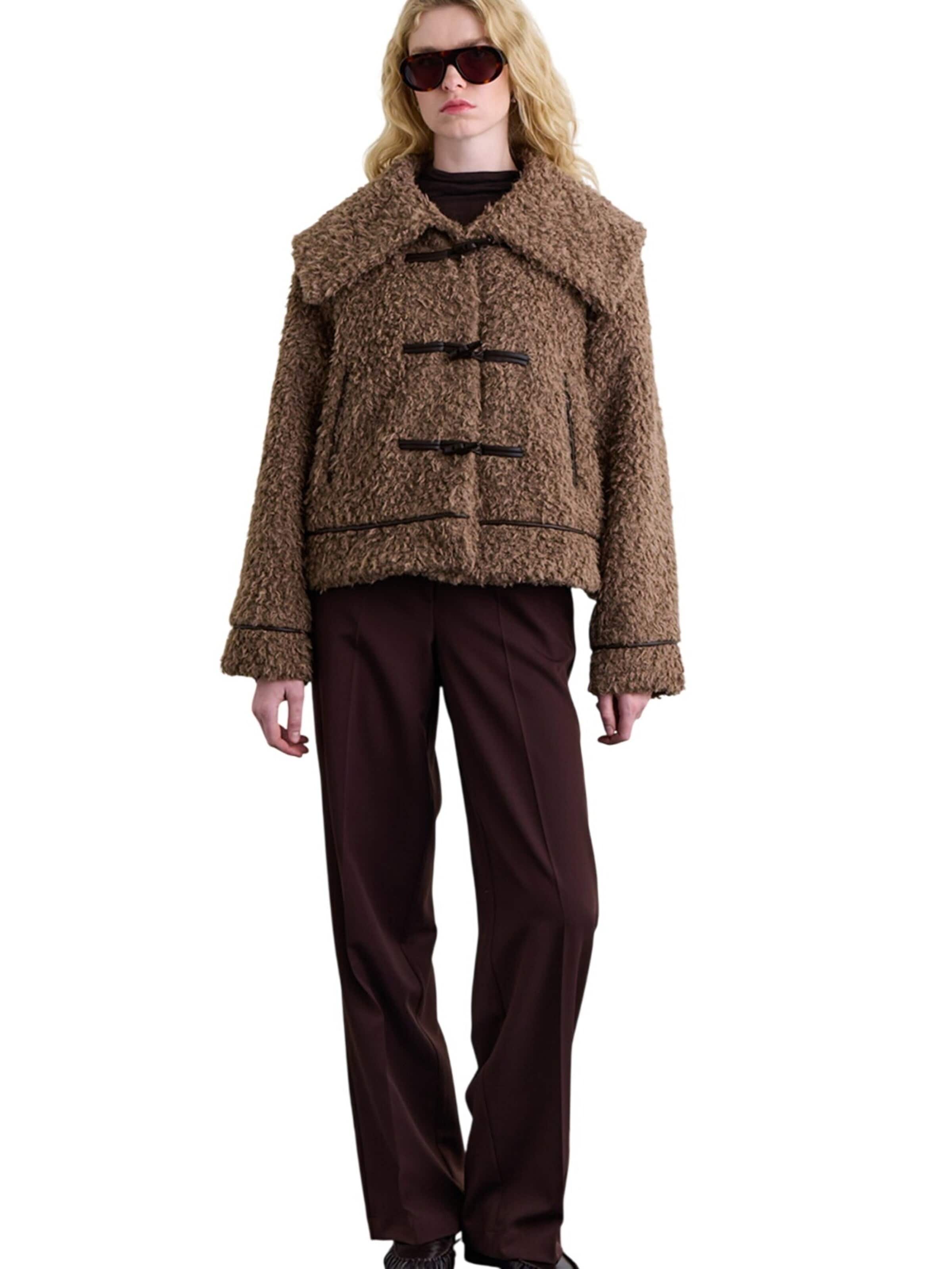 MANUKA Winterjacke‌‌‌‌‌‌‌‌‌ in S-M in braun, Produktansicht