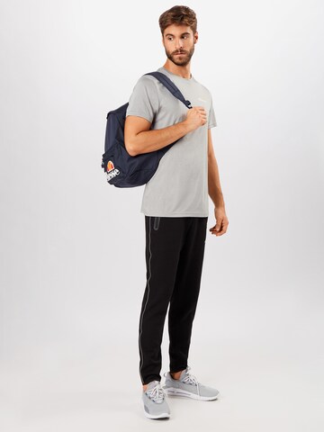 ELLESSE Tapered Sportbyxa 'Diruta' i svart