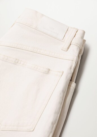 MANGO Zwężany krój Jeansy w kolorze biały